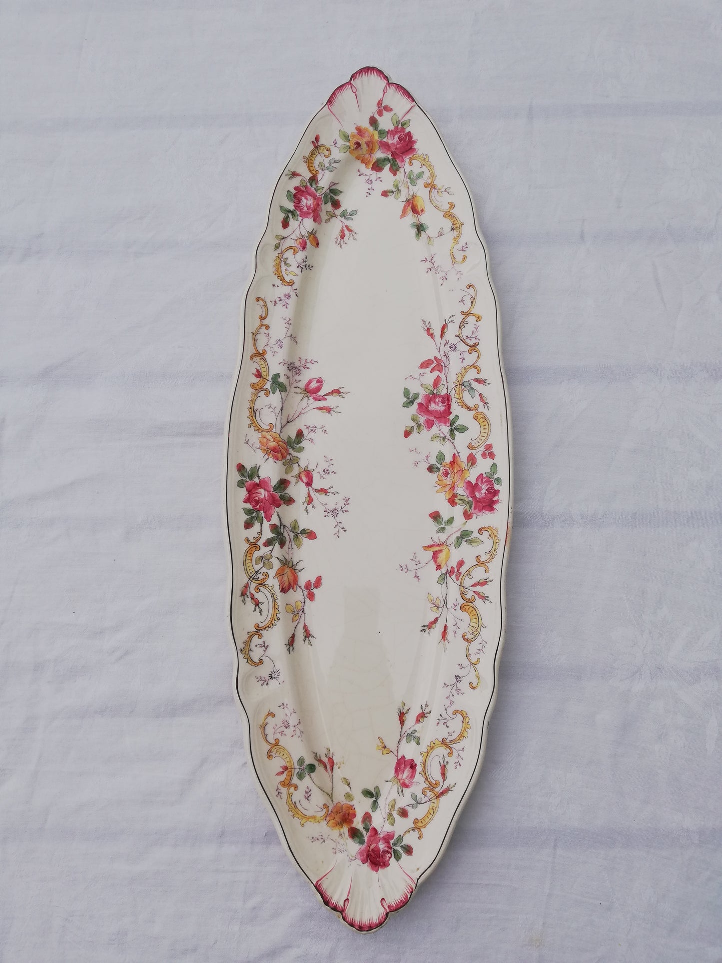 Plat terre de fer polychrome Longchamp